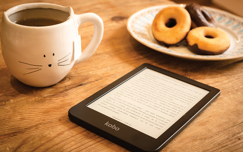 breakfast and reading tablet on table